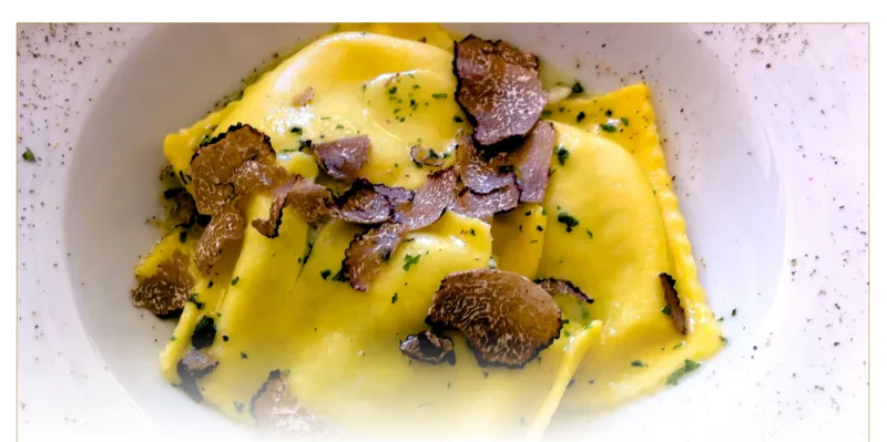 Hand-folded ravioli with fresh black truffle shaved on top at La Botte D'Oro, Leichhardt